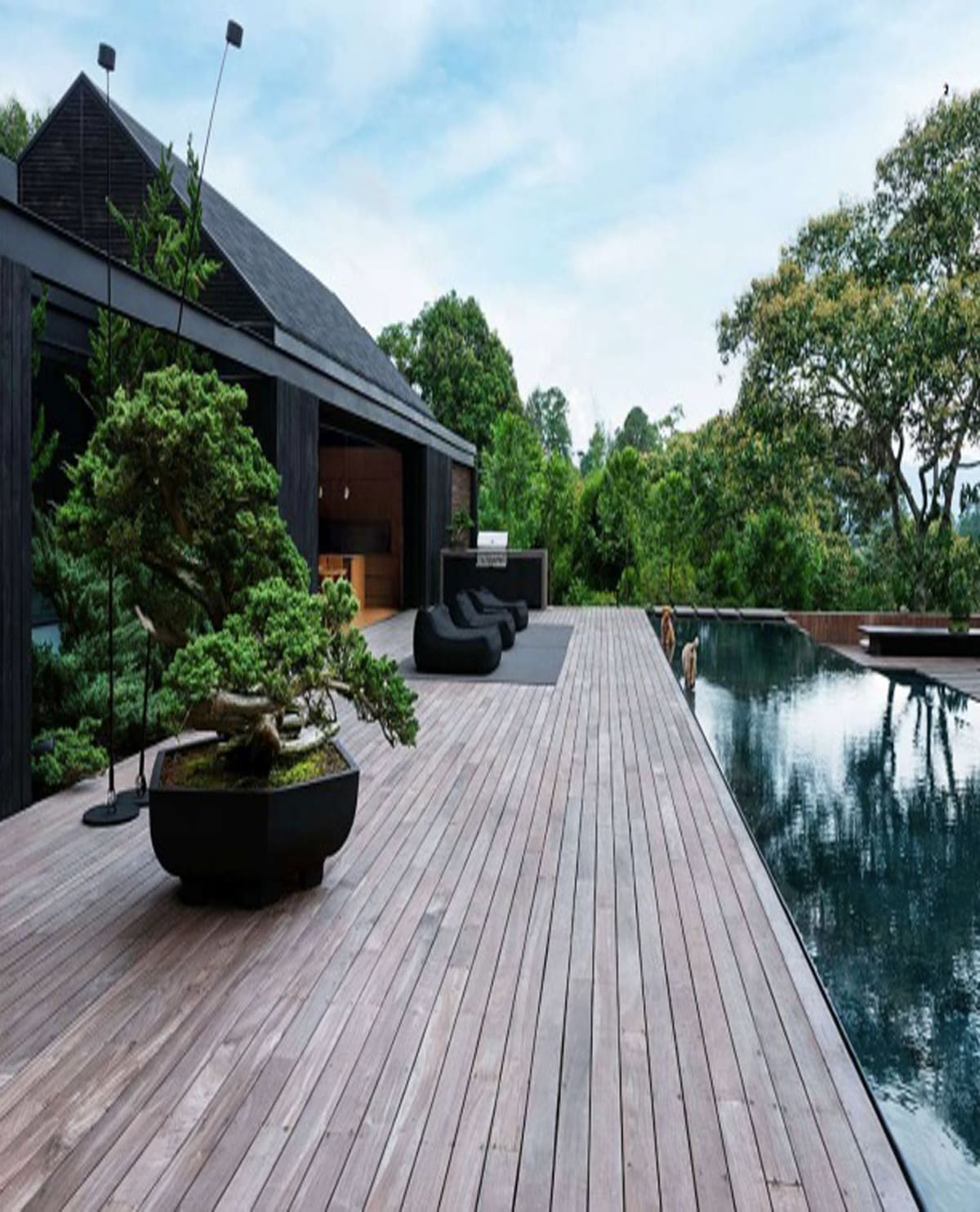 Roofing professional inspecting roof tiles