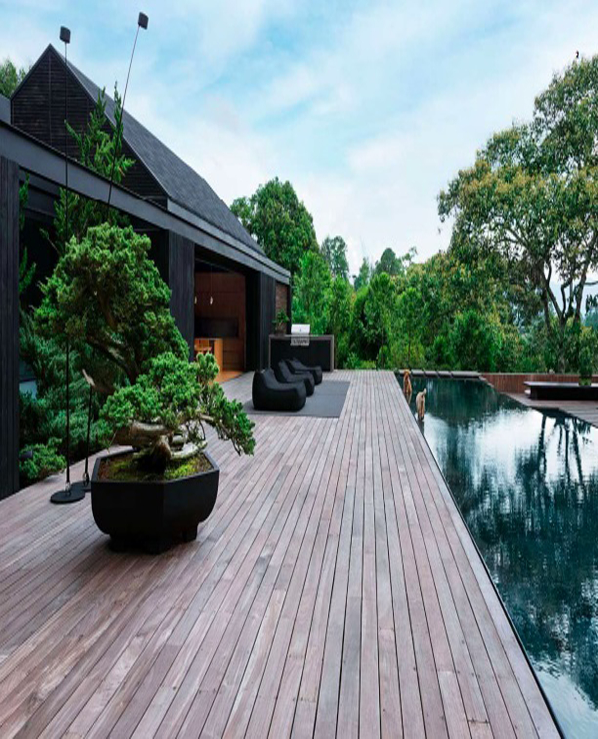 Roofing professional inspecting roof tiles