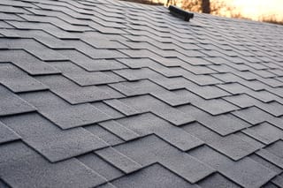 New asphalt shingle installation with underlayment on a home in Jersey City, NJ