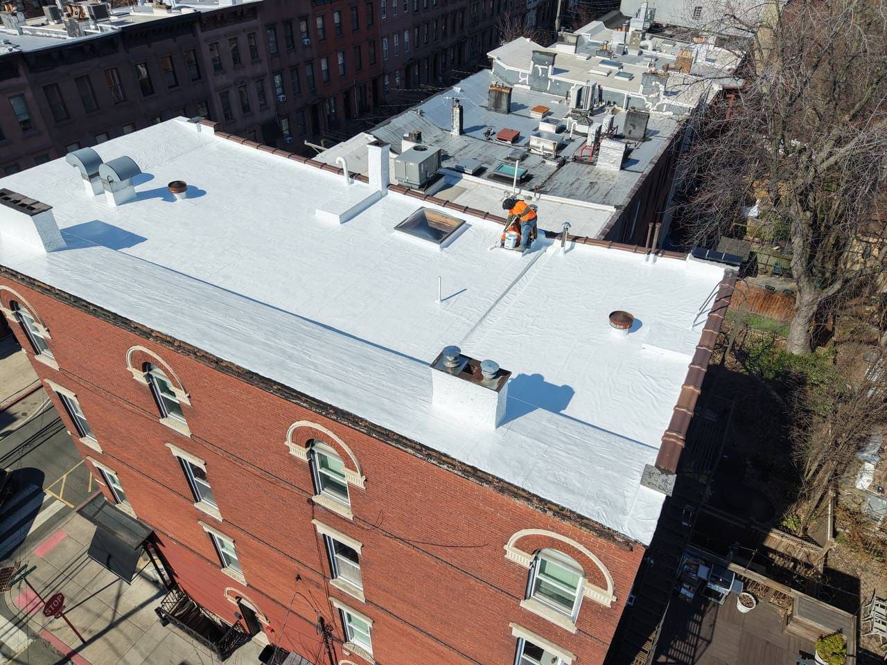 Flat roof replacement on a New Jersey building by Abstract Roofing & Construction